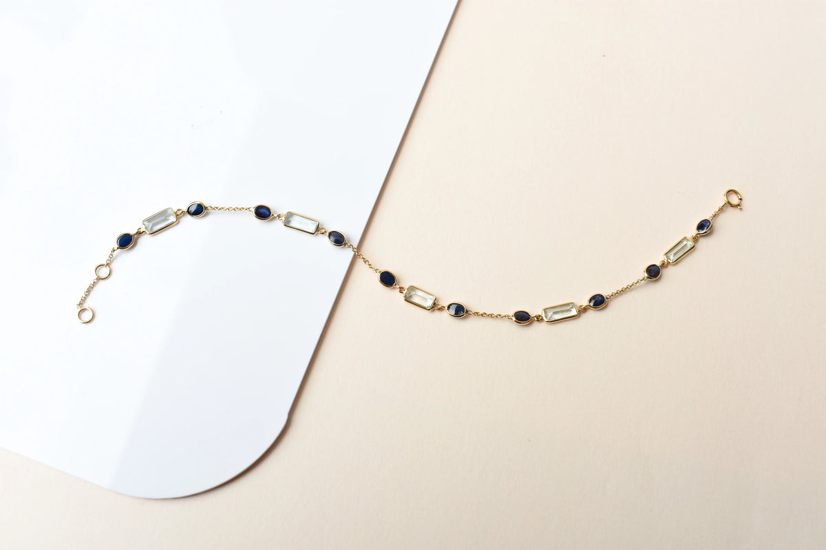 18K gold bracelet with aquamarine and blue sapphire stations