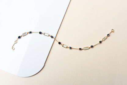 18K gold bracelet with aquamarine and blue sapphire stations