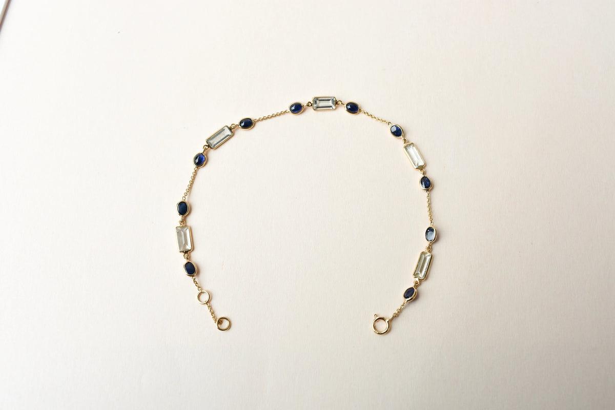 18K gold bracelet with aquamarine and blue sapphire stations