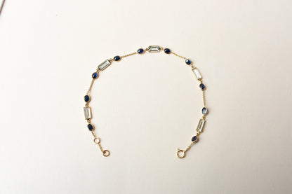 18K gold bracelet with aquamarine and blue sapphire stations