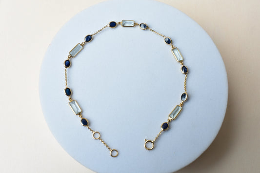 18K gold bracelet with aquamarine and blue sapphire stations