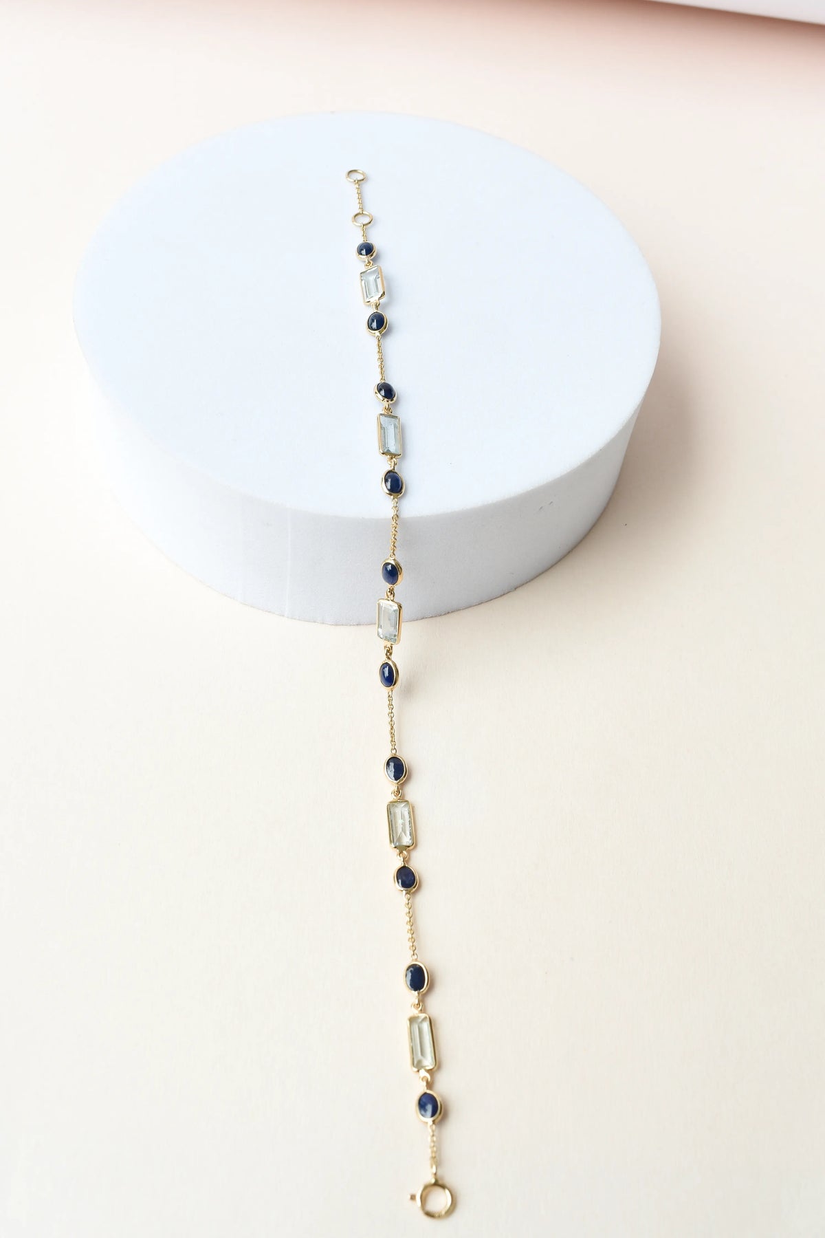 18K gold bracelet with aquamarine and blue sapphire stations