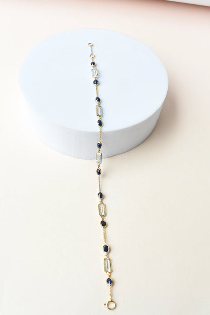 18K gold bracelet with aquamarine and blue sapphire stations