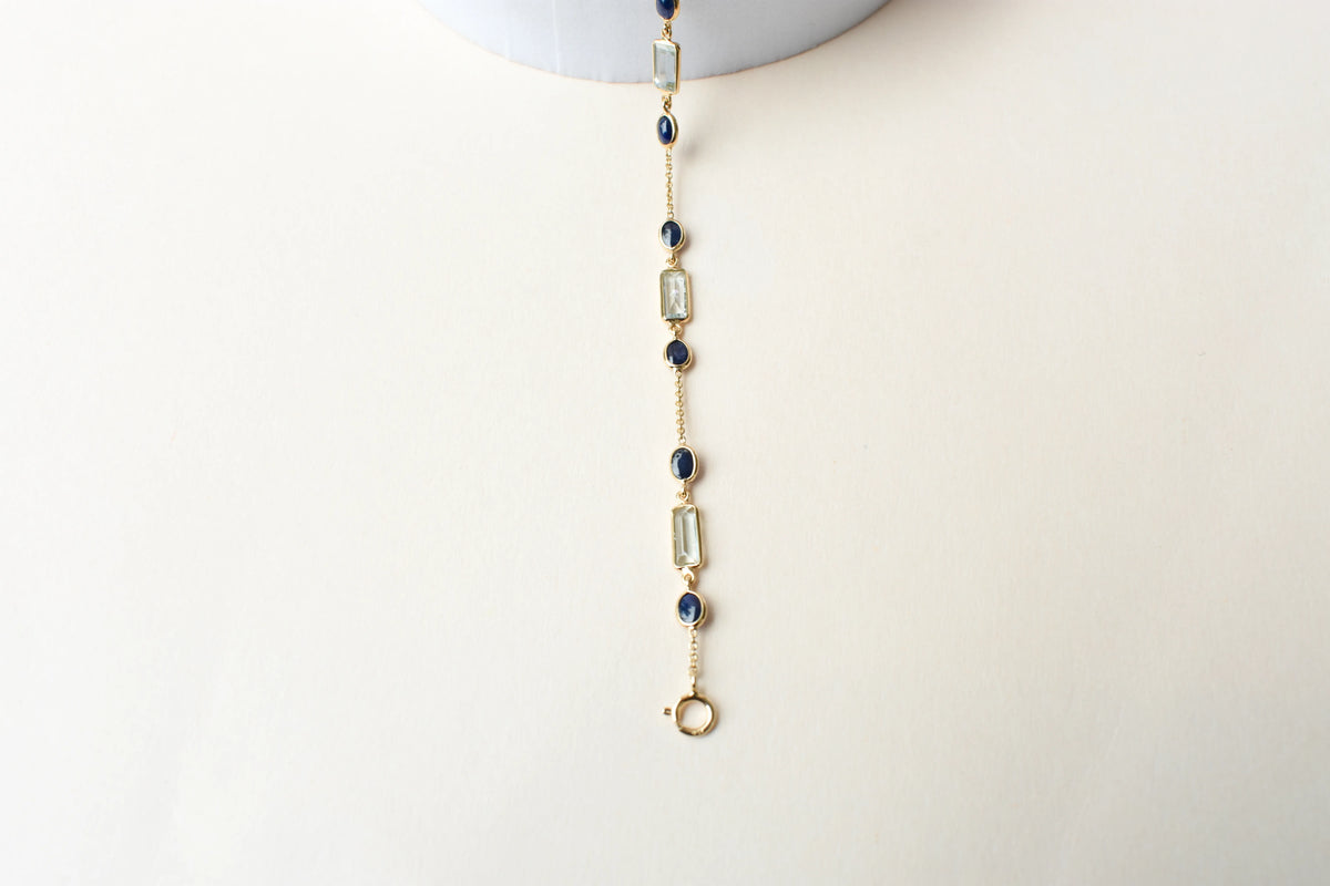 18K gold bracelet with aquamarine and blue sapphire stations