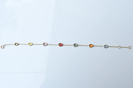 18K gold bracelet with pear-cut multi-color sapphire stations