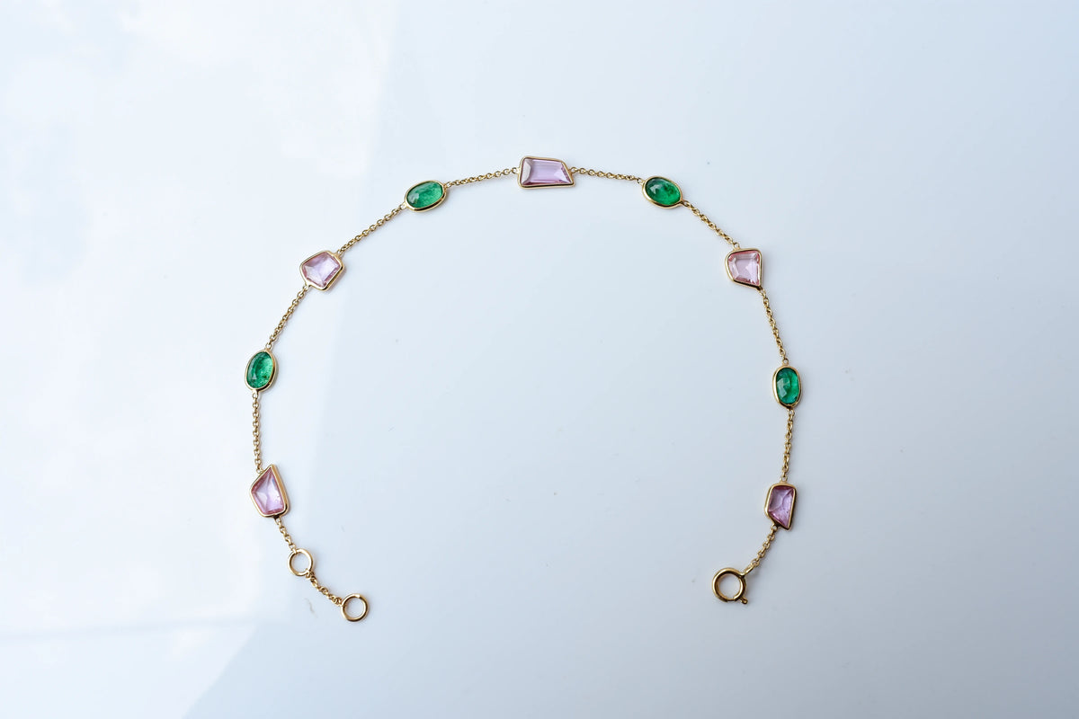 18K gold bracelet with emerald and pink sapphire stations