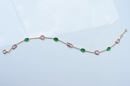 18K gold bracelet with emerald and pink sapphire stations
