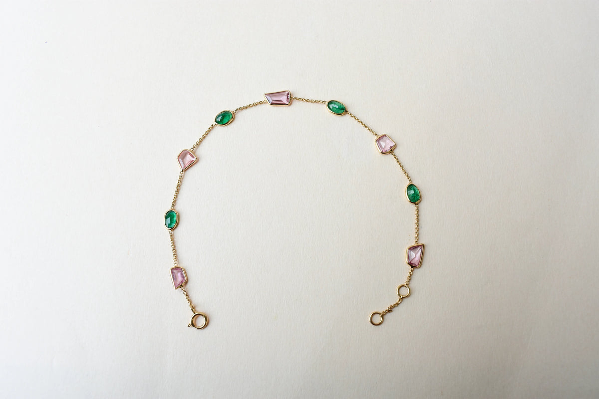 18K gold bracelet with emerald and pink sapphire stations