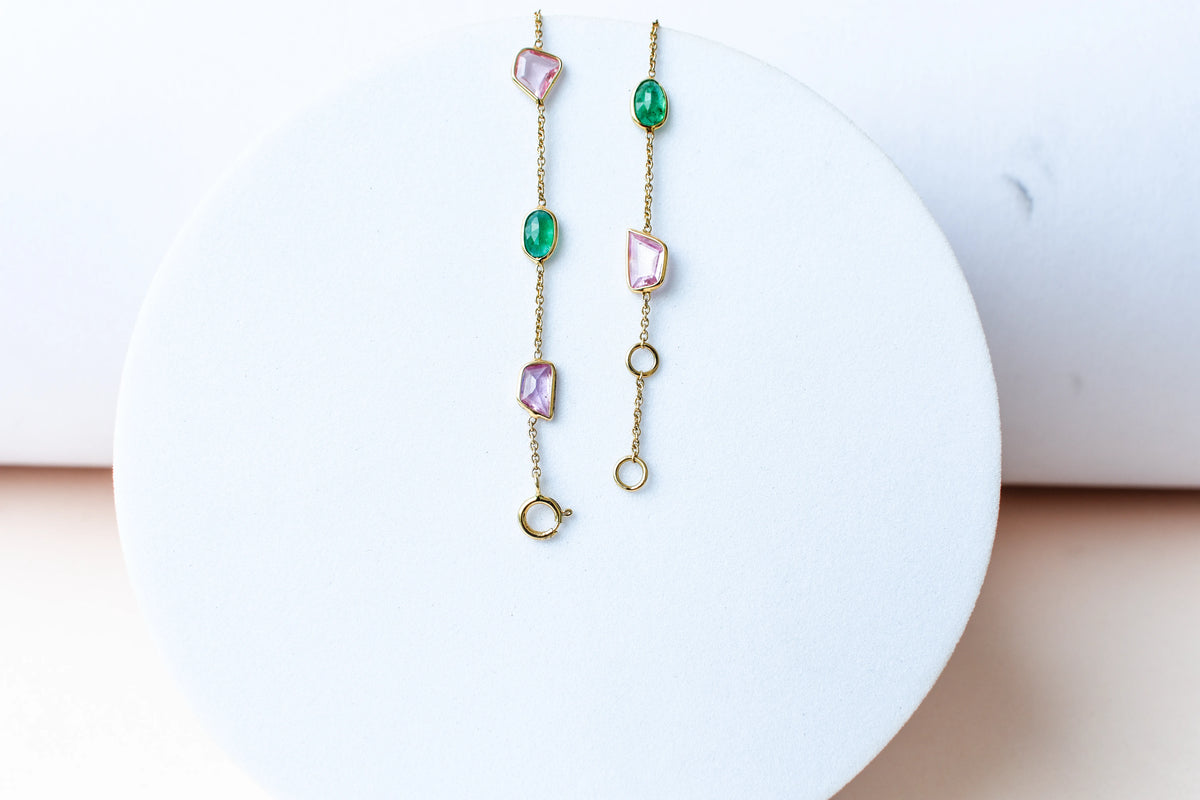 18K gold bracelet with emerald and pink sapphire stations