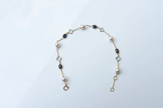 14K gold bracelet with pearls, blue sapphire and aquamarine stations