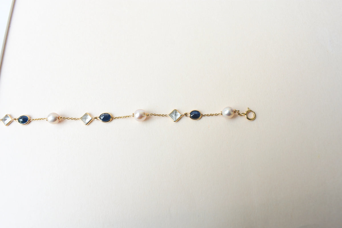 14K gold bracelet with pearls, blue sapphire and aquamarine stations