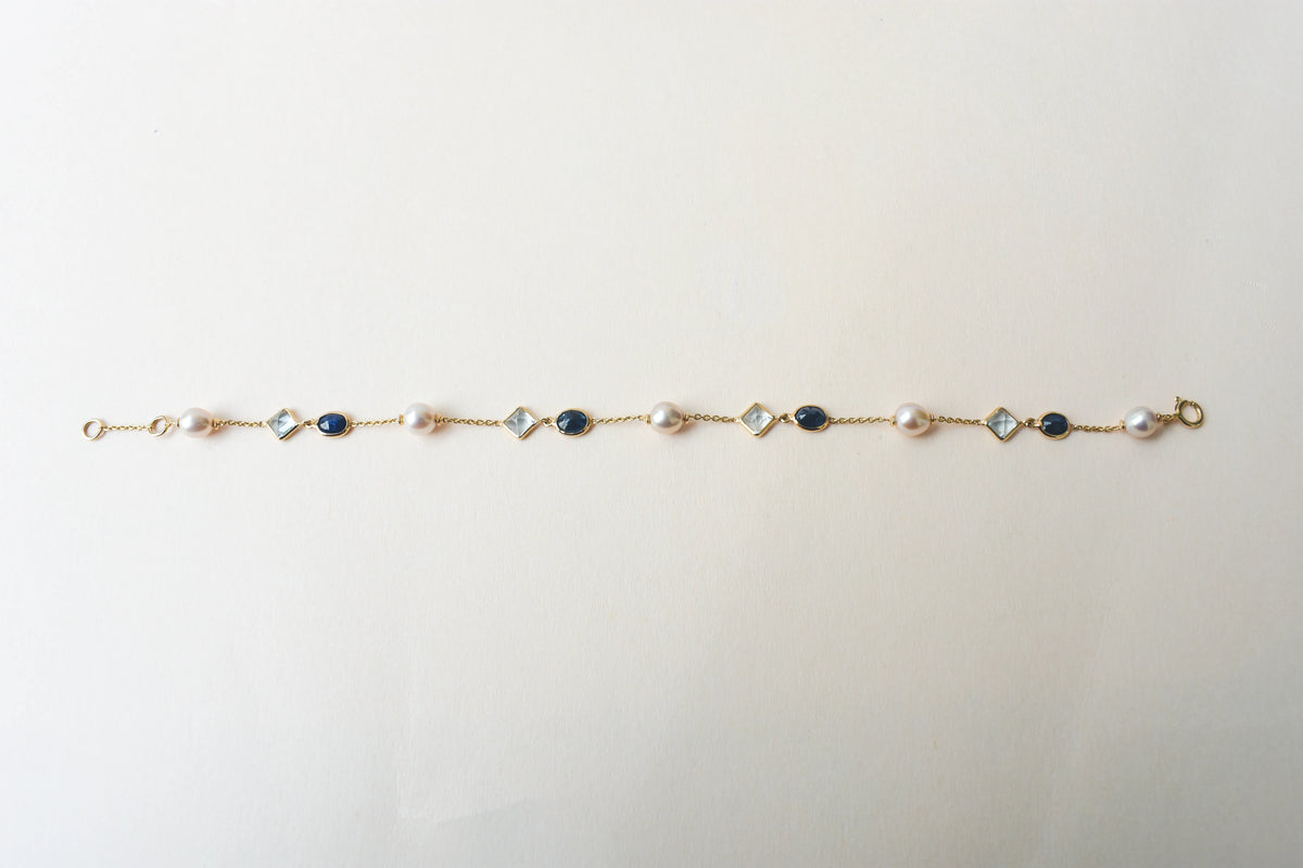 14K gold bracelet with pearls, blue sapphire and aquamarine stations
