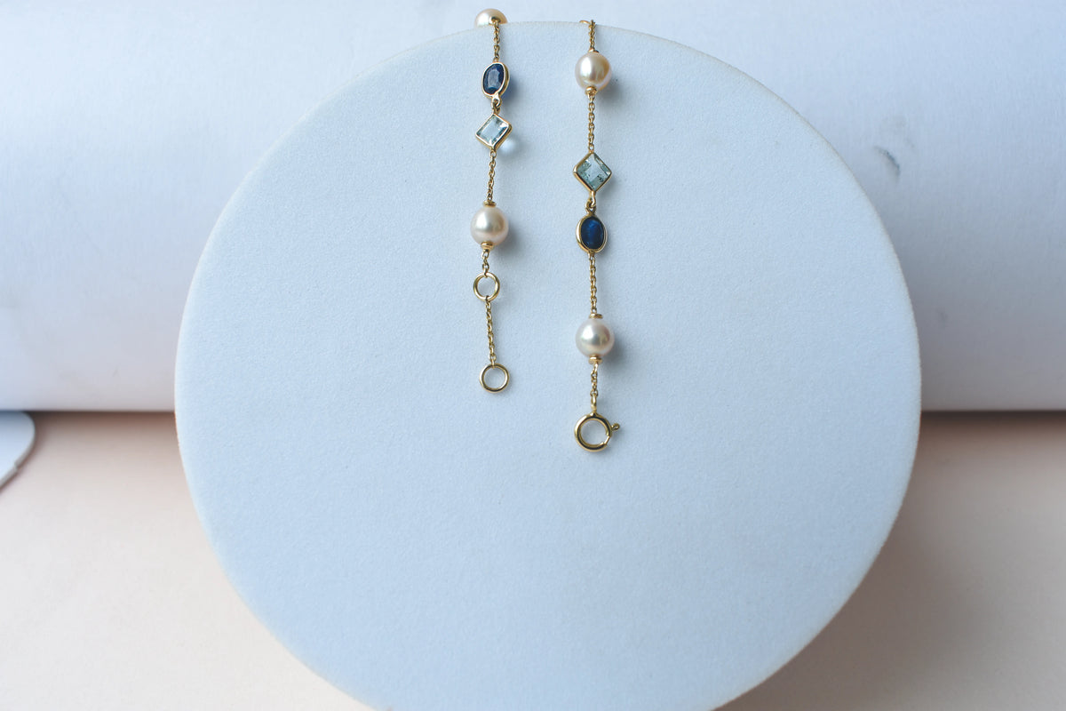14K gold bracelet with pearls, blue sapphire and aquamarine stations