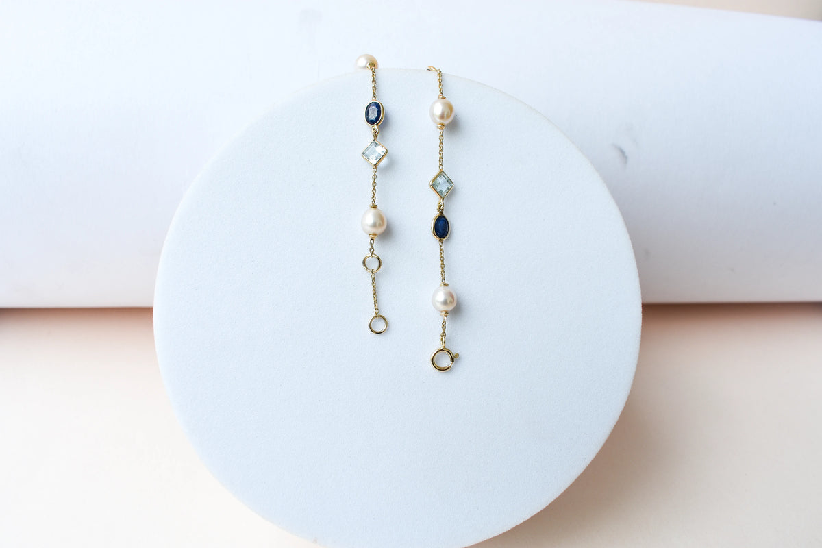 14K gold bracelet with pearls, blue sapphire and aquamarine stations