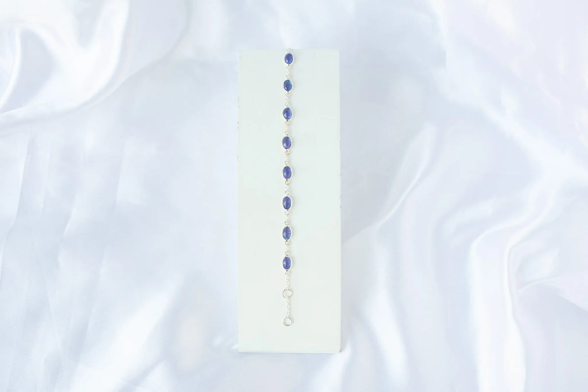 925 silver bracelet with bezel-set oval cabochon tanzanite stones