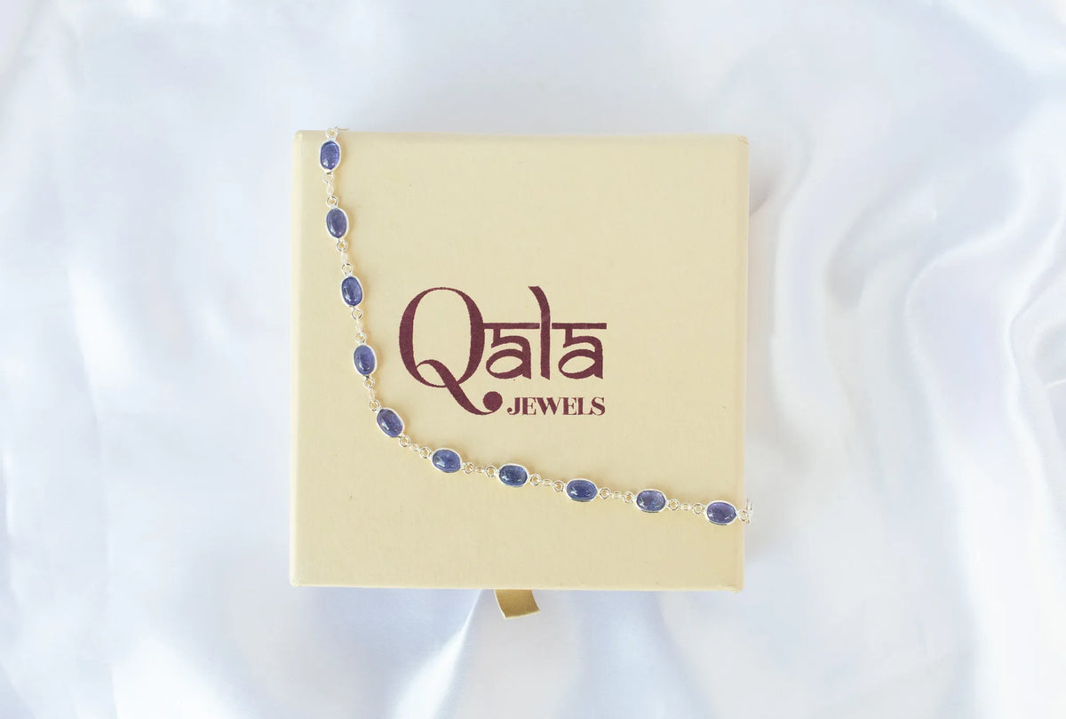 925 silver bracelet with bezel-set oval cabochon tanzanite stones
