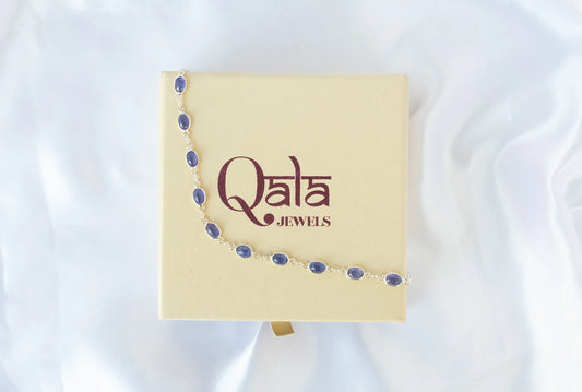 925 silver bracelet with bezel-set oval cabochon tanzanite stones