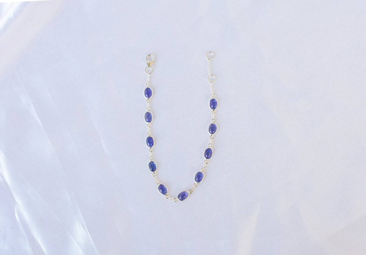 925 silver bracelet with bezel-set oval cabochon tanzanite stones