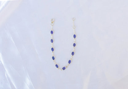 925 silver bracelet with bezel-set oval cabochon tanzanite stones