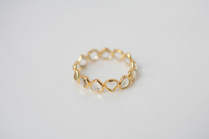 Heart-cut rainbow moonstone gemstone eternity ring in 18K gold with bezel setting