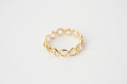 Heart-cut rainbow moonstone gemstone eternity ring in 18K gold with bezel setting