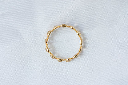 Heart-cut rainbow moonstone gemstone eternity ring in 18K gold with bezel setting