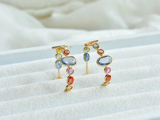 18K gold hoop earrings with graduated multi-color sapphires