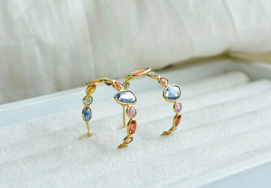 18K gold hoop earrings with graduated multi-color sapphires