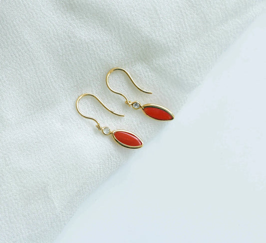 18K gold drop earrings with coral cabochon and diamond accent