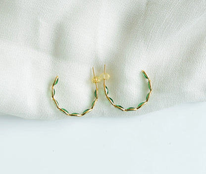 18K gold hoop earrings with marquise-cut emeralds