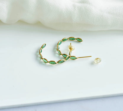 18K gold hoop earrings with marquise-cut emeralds