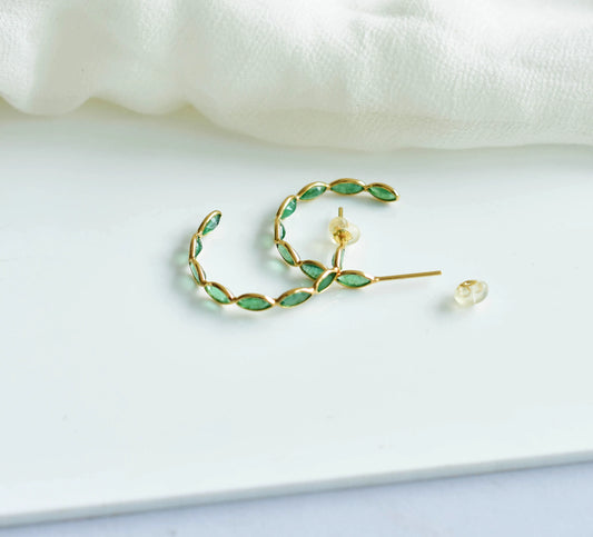 18K gold hoop earrings with marquise-cut emeralds