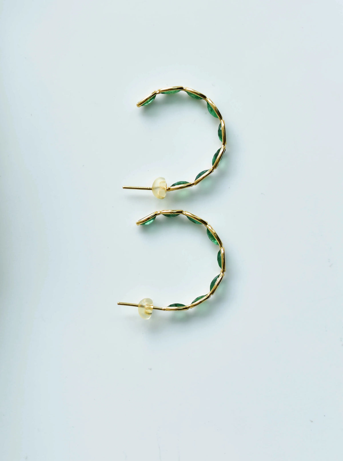 18K gold hoop earrings with marquise-cut emeralds