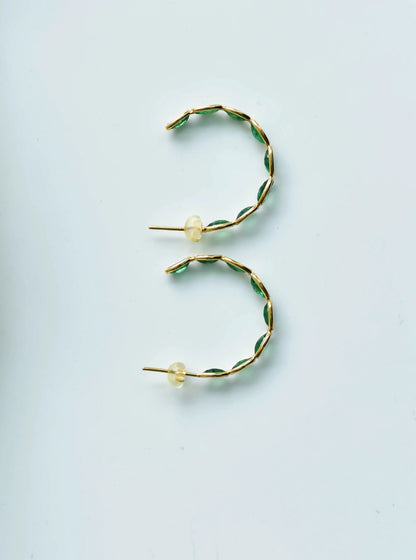 18K gold hoop earrings with marquise-cut emeralds