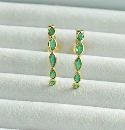 18K gold hoop earrings with marquise-cut emeralds