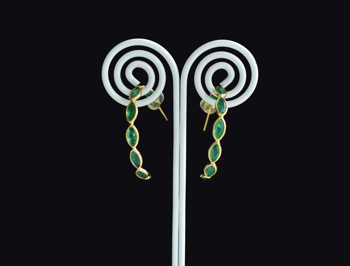 18K gold hoop earrings with marquise-cut emeralds