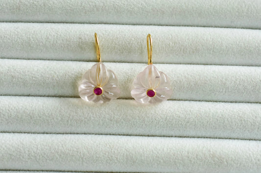 18K gold drop earrings with carved rose quartz flower and ruby center