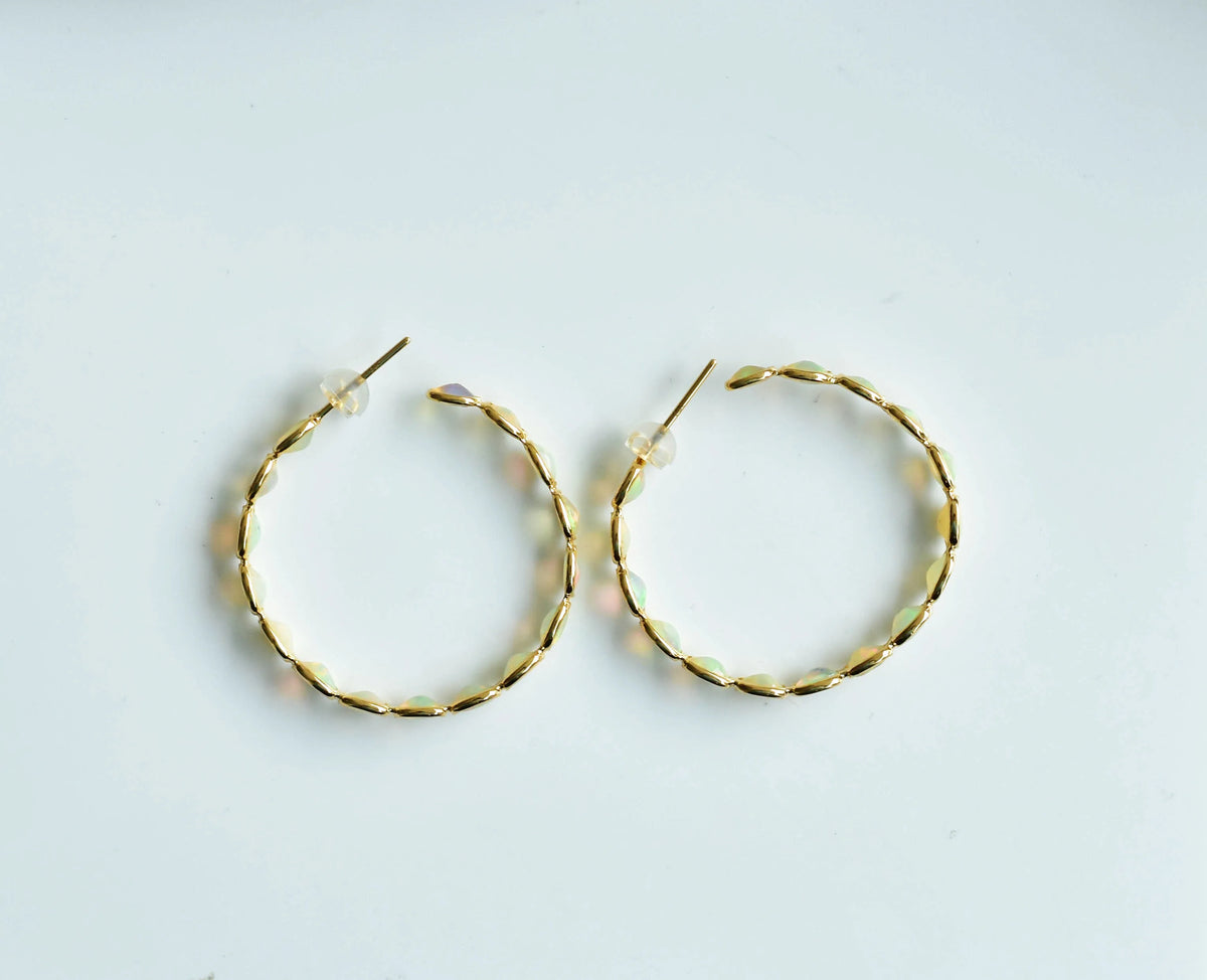 18K gold opal hoop earrings with oval cabochons
