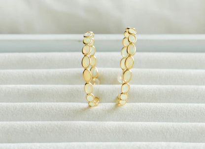 18K gold opal hoop earrings with oval cabochons