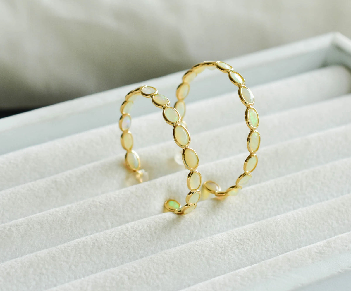 18K gold opal hoop earrings with oval cabochons