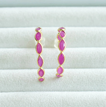 18K gold hoop earrings with marquise-cut rubies