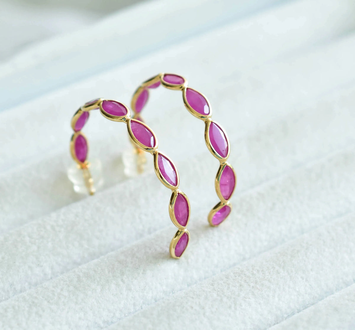 18K gold hoop earrings with marquise-cut rubies