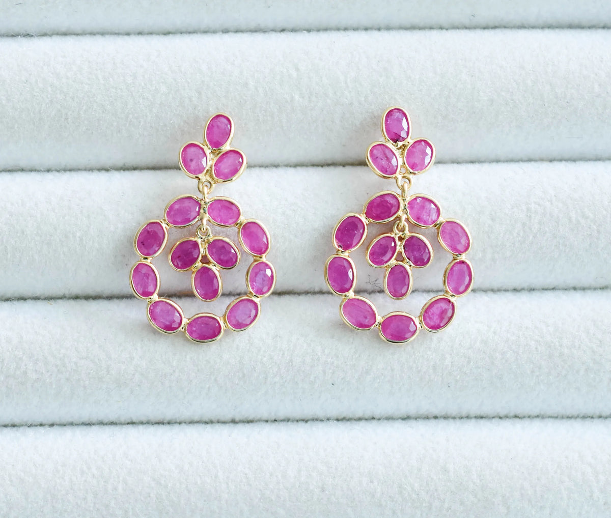18K gold ruby wreath drop earrings with ruby cluster center