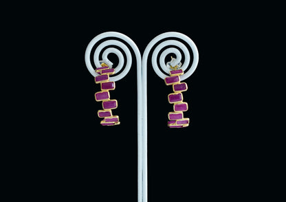 18K gold ear climbers with staggered baguette-cut rubies
