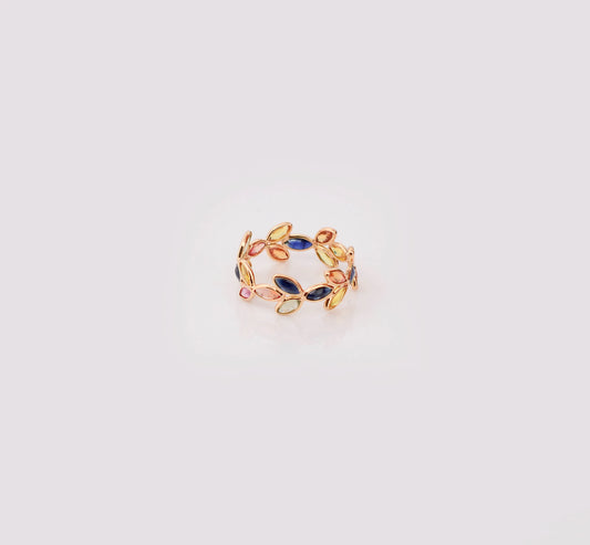 18K gold ring with marquise-cut rainbow sapphires in a leaf and vine motif