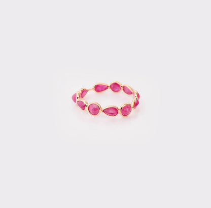 18K gold eternity ring with alternating round and pear-cut rubies
