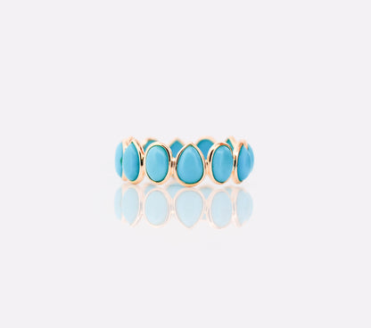 18K gold eternity ring with bezel-set pear and oval turquoise cabochons