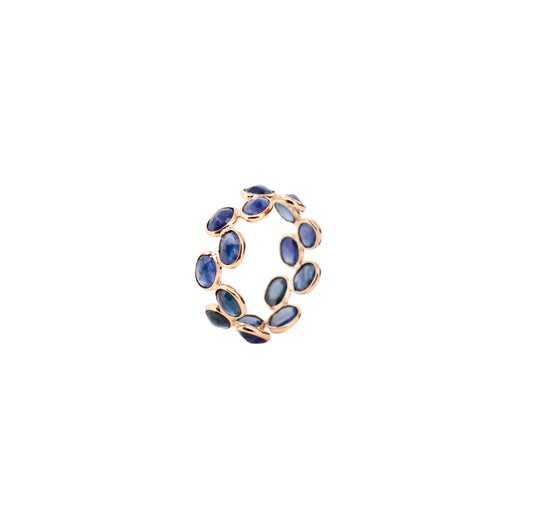 18K gold eternity ring with bezel-set oval-cut blue sapphires