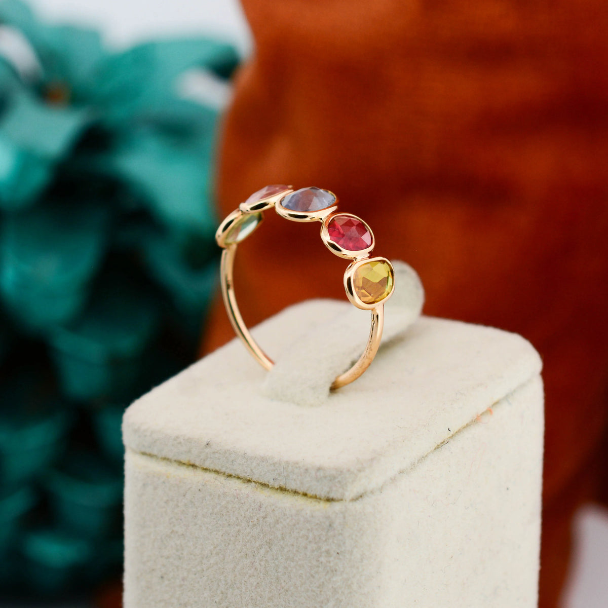 18K gold five stone ring with bezel-set multicolor sapphires