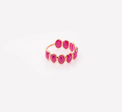 18K gold eternity ring with bezel-set oval-cut rubies